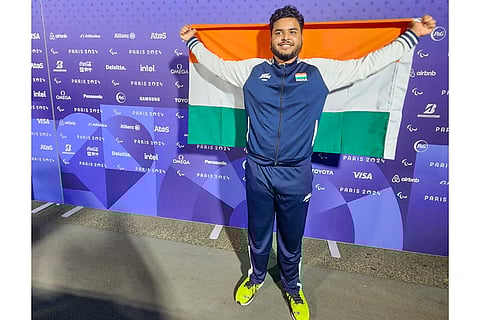 2024 Paris Paralympics: Yogesh Kathuniya, discus thrower, poses for photos after winning the silver medal in F56 category